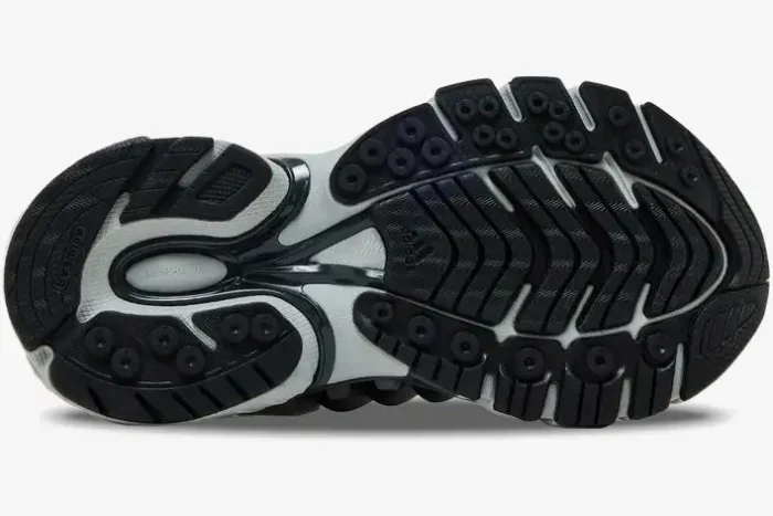 Bottom view of Pharrell x VIRGINIA x adidas Adistar Jellyfish in Solid Grey Black showing the textured rubber outsole. - SKU JP9265