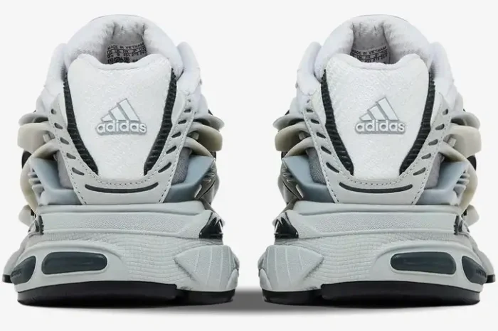 Rear view of Pharrell x VIRGINIA x adidas Adistar Jellyfish sneakers in solid grey and black. - SKU JP9265