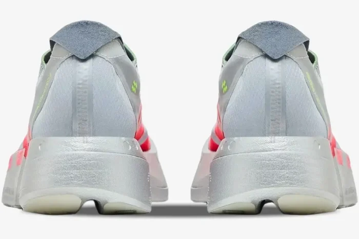 Rear view of Adidas Adizero Adios Pro 4 running shoes in silver and red with thick midsoles. - SKU JR6357