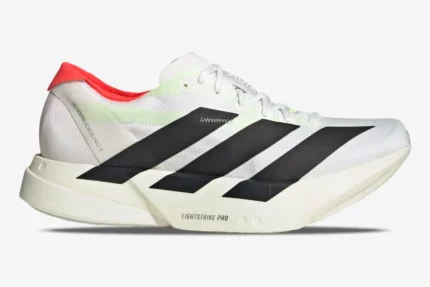 Side profile of the Adidas Adizero Adios Pro 4 running shoe in white, black, and red. - SKU JR1094