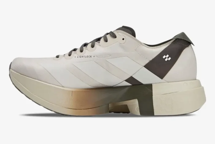 Adidas Adizero Adios Pro 4 x Y-3 running shoe in Alumina Cinder, side profile view showing thick midsole. - SKU JS3154