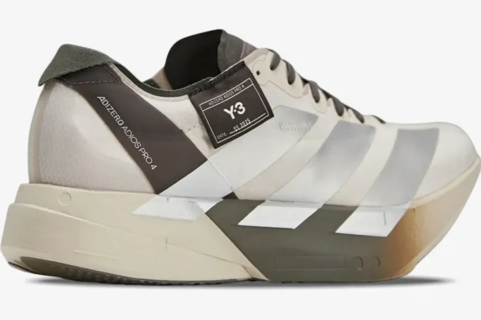 Side view of Adidas Adizero Adios Pro 4 x Y-3 sneakers in Alumina Cinder with silver stripes. - SKU JS3154