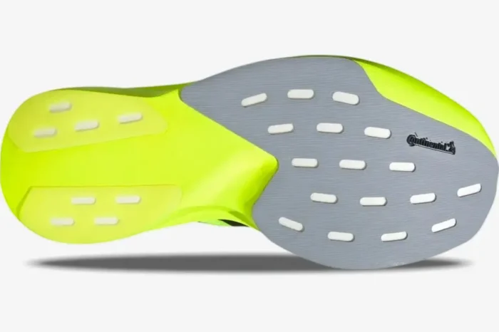 Outsole view of Adidas Adizero Evo SL in Lucid Lemon showing grey Continental rubber and foam. - SKU JR3416