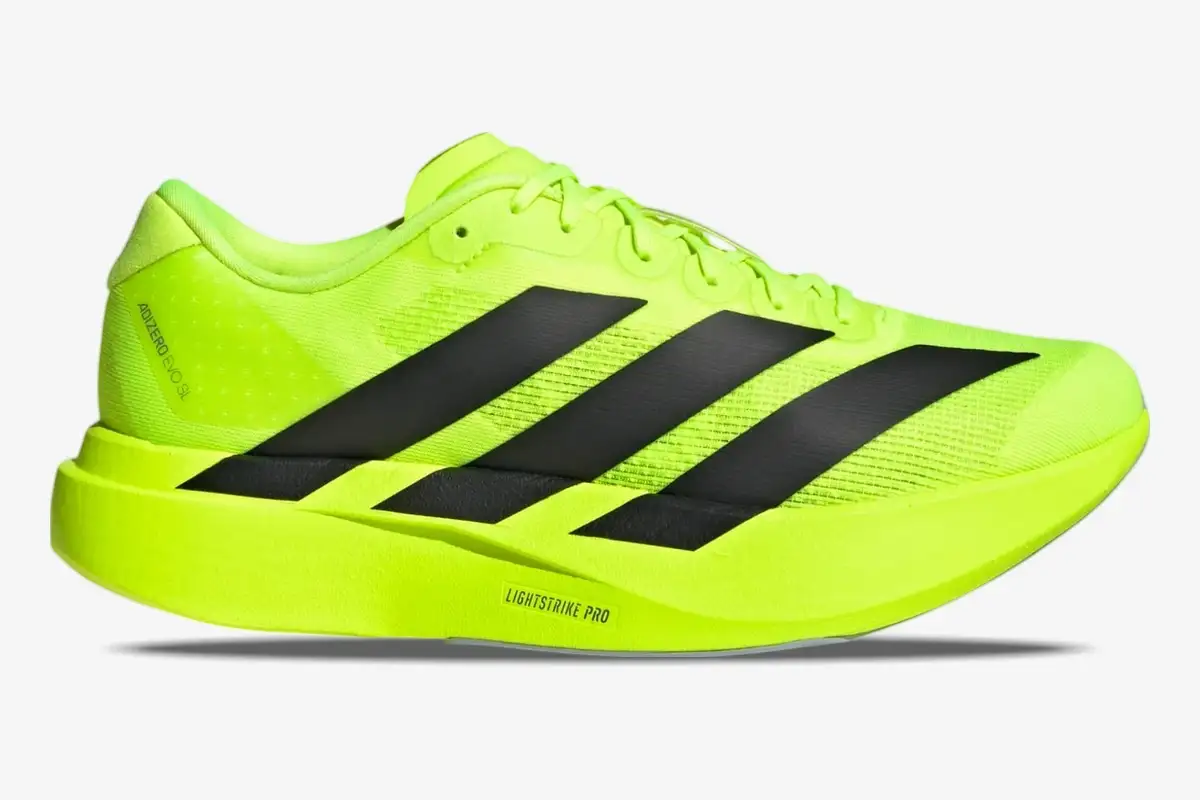 adidas-adizero-evo-sl-lucid-lemon-side-view-jr3416-833-674 Side view of Adidas Adizero Evo SL running shoe in Lucid Lemon yellow with black stripes. - SKU JR3416