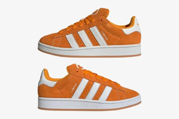 Side profile of Adidas Campus 00s sneakers in Amber Tint orange with white stripes and gum outsoles. - SKU ID1436