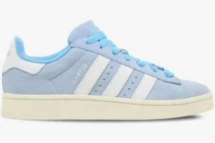 Side profile of Adidas Campus 00s sneakers in ambient sky blue with white stripes and cream sole. - SKU GY9473