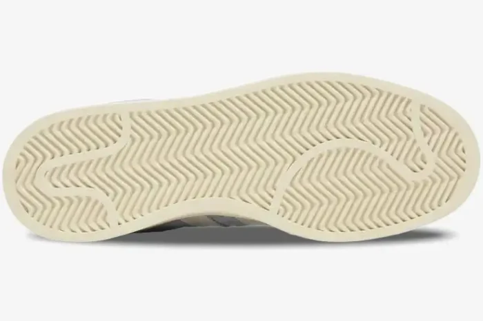 Bottom view of the off-white rubber outsole of the Adidas Campus 00s Ambient Sky Blue White sneaker. - SKU GY9473