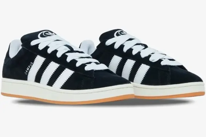 Adidas Campus 00s Core Black sneakers with white stripes and gum soles, three-quarter front view. - SKU HQ8708