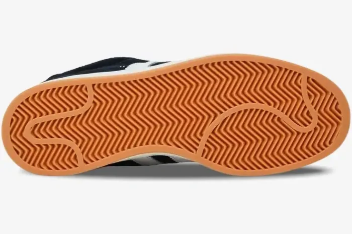 Bottom view of the Adidas Campus 00s Core Black Gum showing the gum rubber outsole with herringbone traction pattern. - SKU HQ8708