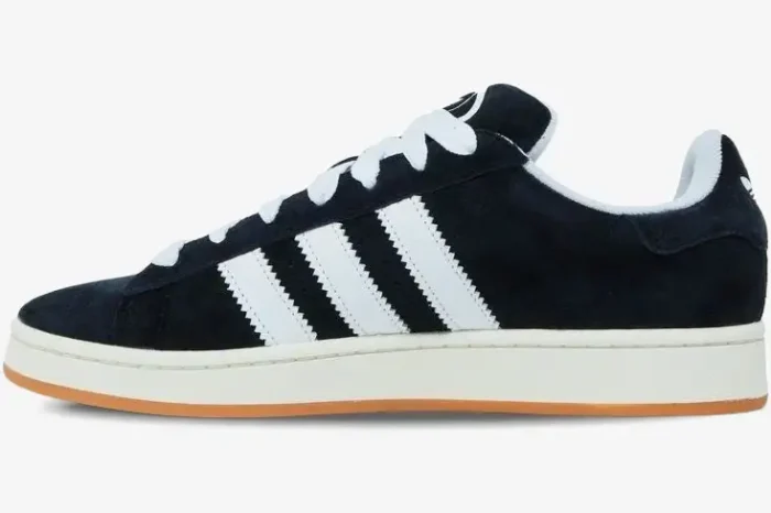Side profile of Adidas Campus 00s Core Black sneakers with white stripes and gum rubber soles. - SKU HQ8708