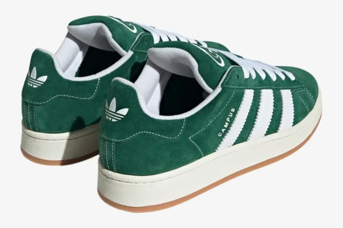 Rear view of Adidas Campus 00s dark green suede sneakers featuring white stripes and gum outsoles. - SKU JK4971