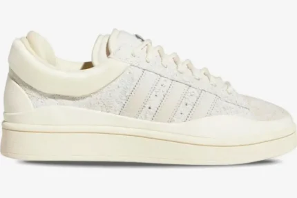 Side profile of the Adidas Campus Light x Bad Bunny Cream sneaker in off-white suede. - SKU FZ5823