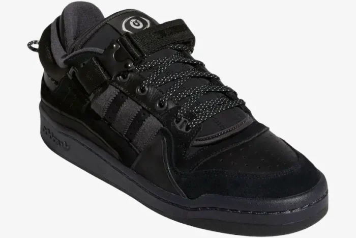 Triple black Adidas Forum Buckle Low x Bad Bunny shoes in a three-quarter perspective view. - SKU GW5021