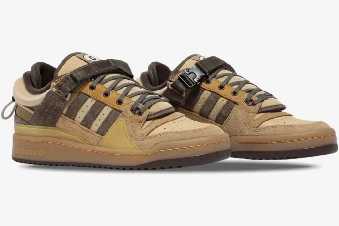 Pair of Adidas Forum Buckle Low x Bad Bunny Café sneakers in brown and tan, side three-quarter view. - SKU GW0264