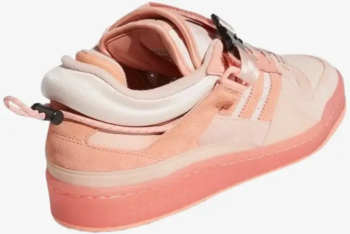 Rear view of the Adidas Forum Low x Bad Bunny Pink Easter Egg sneaker featuring a padded collar and buckle. - SKU GW0265
