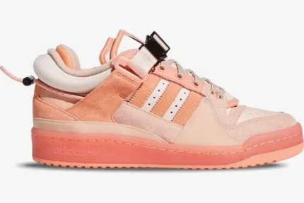 Side profile of Adidas Forum Low x Bad Bunny Pink Easter Egg sneakers in shades of peach and pink. - SKU GW0265