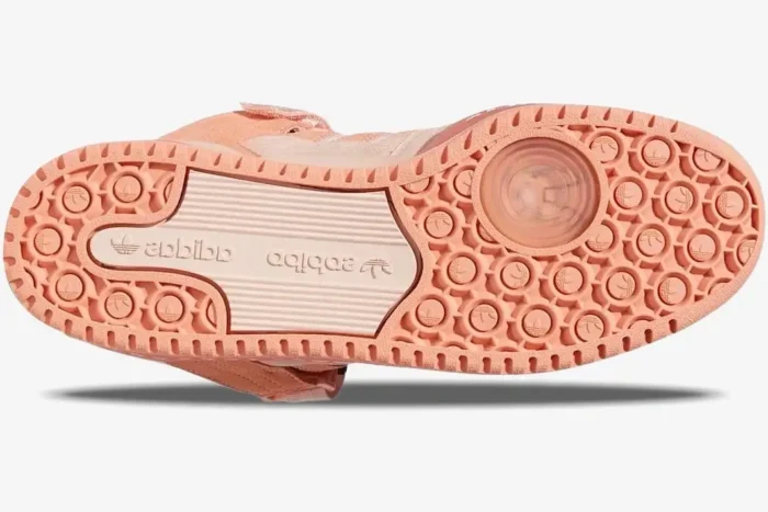 Bottom view of the pink Adidas Forum Low x Bad Bunny Pink Easter Egg outsole with circular traction. - SKU GW0265