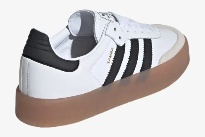 Rear-side view of Adidas Sambae Cloud White Metallic Gold shoes featuring a platform gum sole and black stripes. - SKU JI1349
