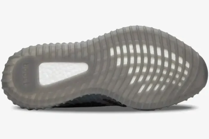 Bottom view of Adidas Yeezy 350 V2 Beluga 2.0 showing grey translucent outsole and white Boost foam. - SKU AH2203