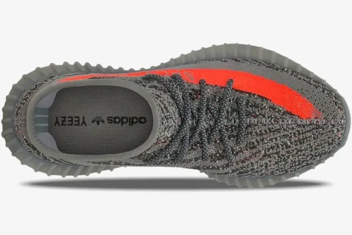 Top-down view of the Adidas Yeezy 350 V2 Beluga OG sneaker in grey with a solar red stripe. - SKU BB1826