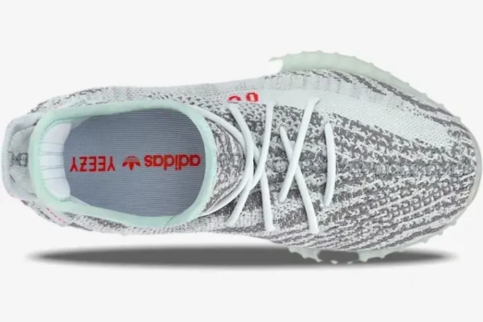 Top view of Adidas Yeezy 350 V2 Blue Tint sneaker showing the insole and light blue lining. - SKU B37571