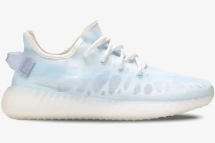 Side profile of Adidas Yeezy 350 V2 Mono Ice sneakers in light blue with a translucent white sole. - SKU GW2869