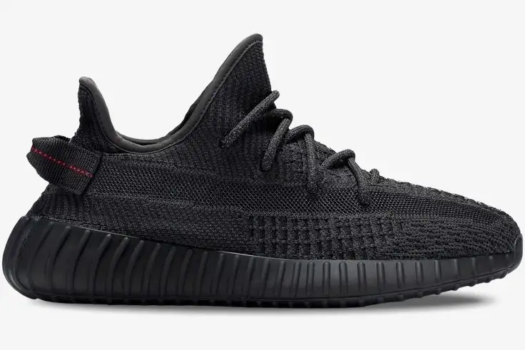 adidas-yeezy-350-v2-static-black-side-view-fu9006-558-685 Side profile of the Adidas Yeezy 350 V2 Static Black Non-Reflective sneaker with black Primeknit upper. - SKU FU9006