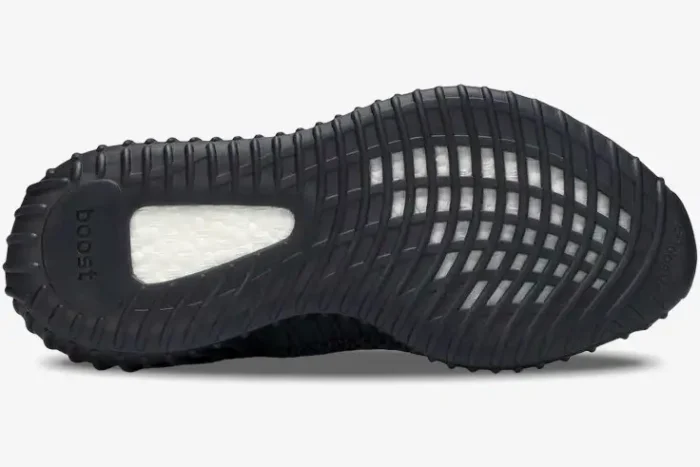 Bottom view of Adidas Yeezy 350 V2 Static Black Non-Reflective showing black outsole and white Boost foam. - SKU FU9006