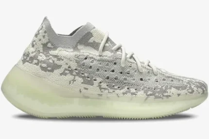 Side profile of Adidas Yeezy 380 Alien sneakers in grey and white camo with a translucent sole. - SKU FV3260