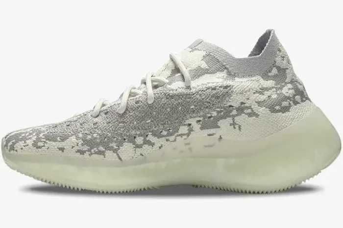 Side view of Adidas Yeezy 380 Alien sneakers featuring a grey and white knit upper and translucent sole. - SKU FV3260