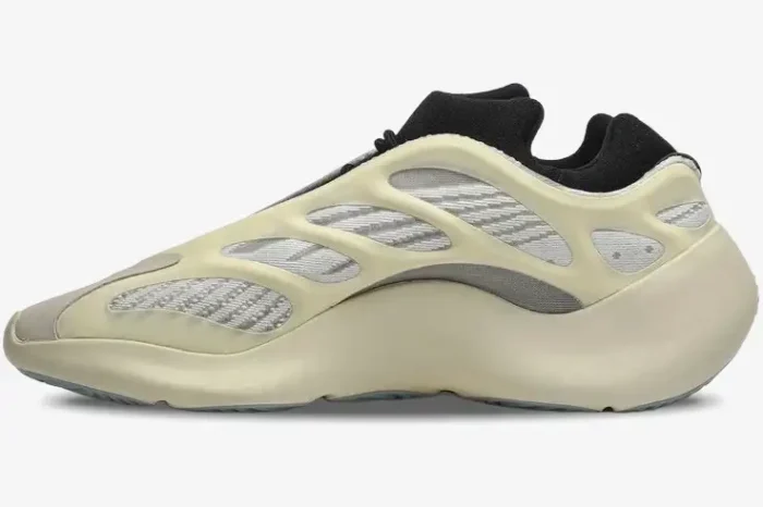 Adidas Yeezy 700 V3 Azael sneaker in off-white and grey, shown from a side profile perspective. - SKU FW4980