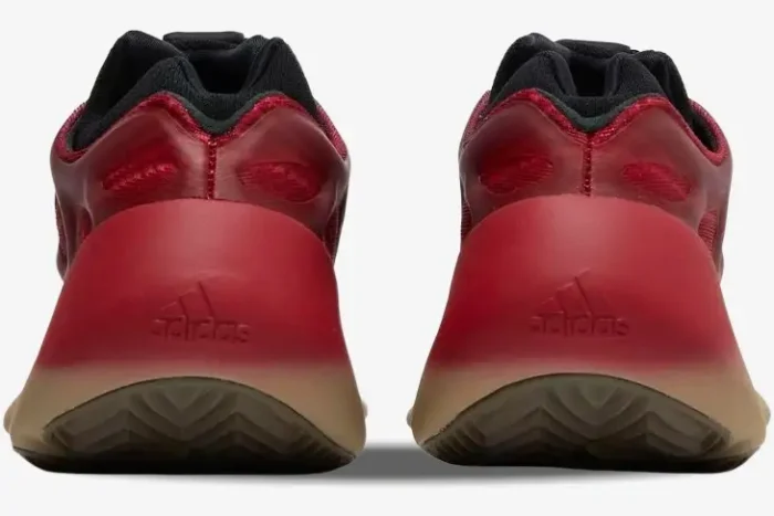 Rear view of Adidas Yeezy 700 V3 Fade Carbon sneakers showing the red to tan gradient heel and Adidas logo. - SKU GW1814