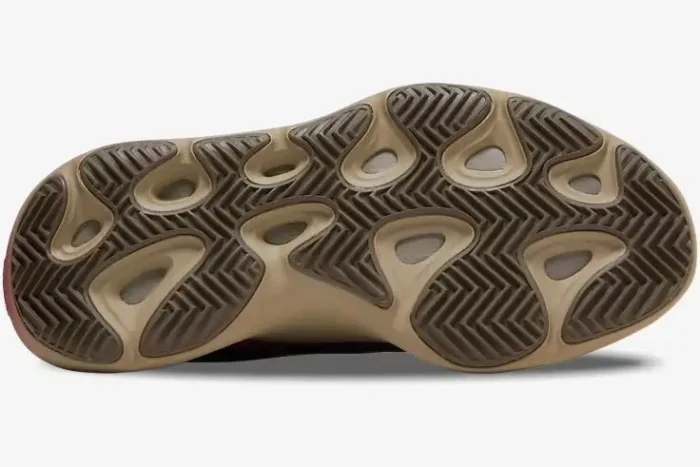 Bottom view of the Adidas Yeezy 700 V3 Fade Carbon outsole with tan and brown traction patterns. - SKU GW1814
