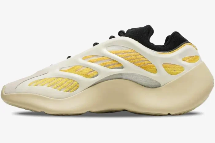 Side profile of Adidas Yeezy 700 V3 Safflower sneakers with yellow mesh and cream RPU cage. - SKU G54853