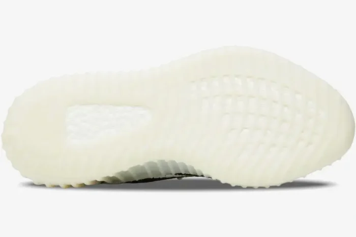 Bottom view of the Adidas Yeezy Boost 350 V2 Zebra showing the translucent white outsole and Boost cushioning. - SKU CP9654