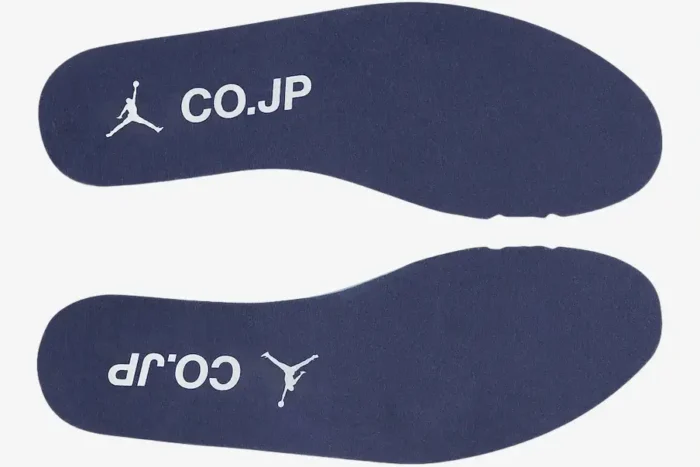 Top view of navy blue insoles for Air Jordan 1 High Midnight Navy CO.JP with white Jumpman and CO.JP logos. - SKU DC1788-100