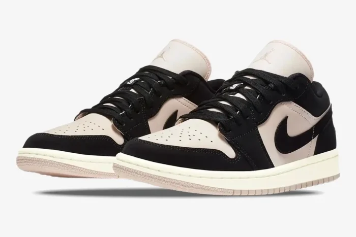 Women's Air Jordan 1 Low in Black and Guava Ice, three-quarter front view of both sneakers. - SKU DC0774-003