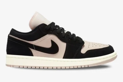 Air Jordan 1 Low Black Guava Ice women's sneaker in a side profile view with black and pale pink panels. - SKU DC0774-003