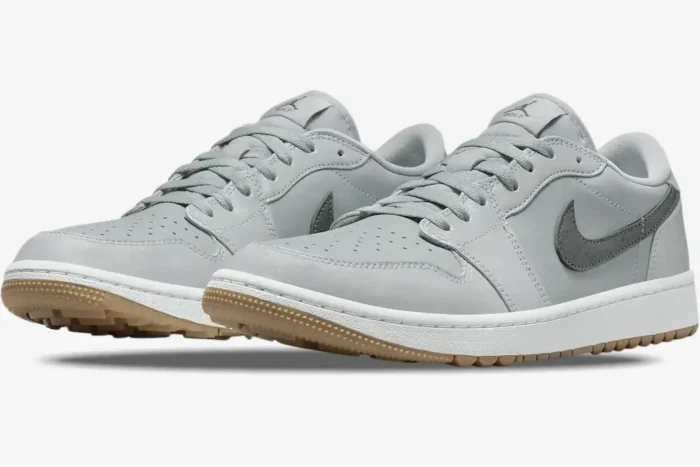 Air Jordan 1 Low Golf Wolf Grey sneakers in a three-quarter front view with gum soles. - SKU DD9315-006