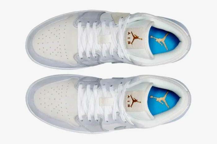 Top-down view of the Air Jordan 1 Low Paris City Pack in white and light grey. - SKU CV3043-100