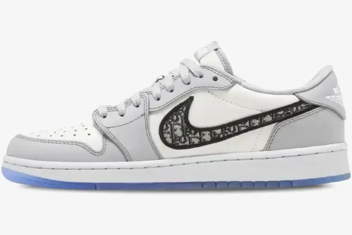 Side profile of Air Jordan 1 Low Retro x Dior in white and grey with Dior Oblique swoosh and icy blue sole. - SKU CN8608-002