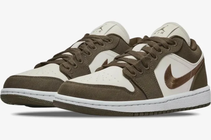 Air Jordan 1 Low SE Light Olive sneakers in a three-quarter front view with canvas overlays and embroidered Swoosh. - SKU DV0426-301