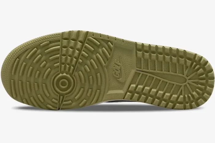 Bottom view of the Air Jordan 1 Low x Travis Scott 'Neutral Olive' Golf Edition outsole with traction pattern. - SKU FZ3124-200