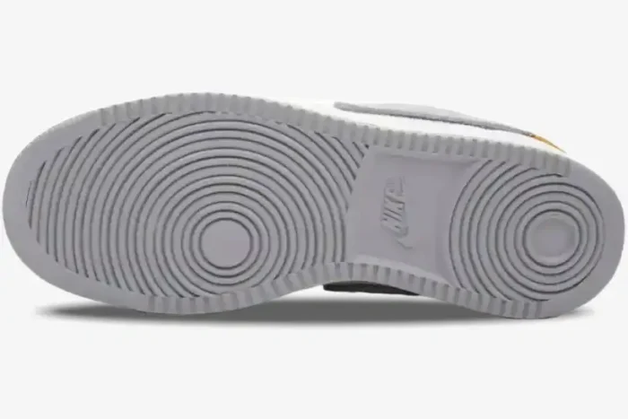 Bottom view of the Air Jordan 1 Low x Union LA White Neutral Grey outsole with circular grip pattern. - SKU DO8912-101