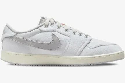 Side view of Air Jordan 1 Low x Union LA sneakers in white and neutral grey with canvas upper. - SKU DO8912-101