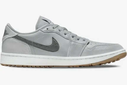 Side view of Air Jordan 1 Low Wolf Grey sneakers with a speckled swoosh and gum rubber outsole. - SKU DD9315-006