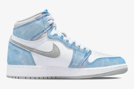 Profile shot of the Air Jordan 1 Retro High OG Hyper Royal featuring faded blue suede and white leather. - SKU 555088-402