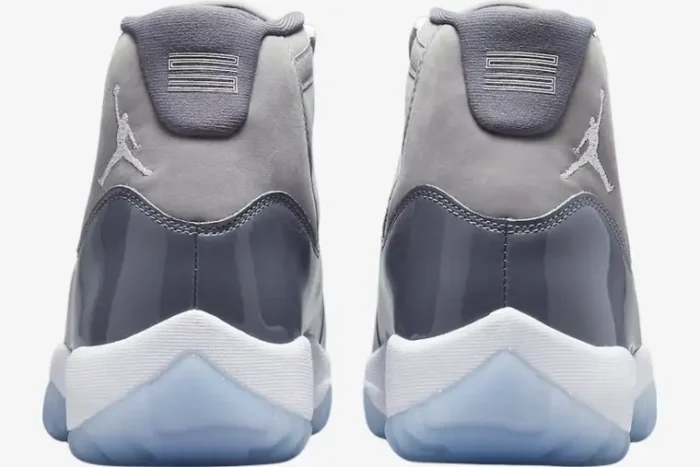 Rear view of Air Jordan 11 Retro Cool Grey sneakers featuring the iconic Jumpman logo and patent leather. - SKU CT8012-005