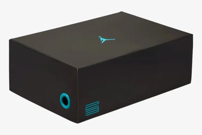 Black Air Jordan 11 Retro Gamma Blue shoebox with cyan logos, angled view. - SKU 378037-006