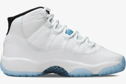 Air Jordan 11 Retro Legend Blue sneaker in white with an icy blue outsole, side profile view. - SKU 378037-117